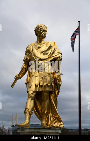 Statue of a King Charles II at the Royal Hospital Chelsea in London, England. The golden statue depicts the monarch as a Roman. Stock Photo