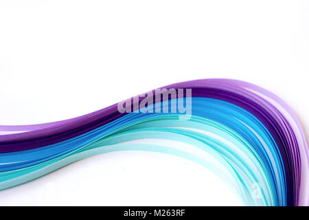Decorative blue and violet paper stripes on white background with copy space; abstract lines background Stock Photo
