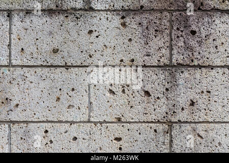 Rough texture of concrete brick wall; Tokyo, Japan Stock Photo