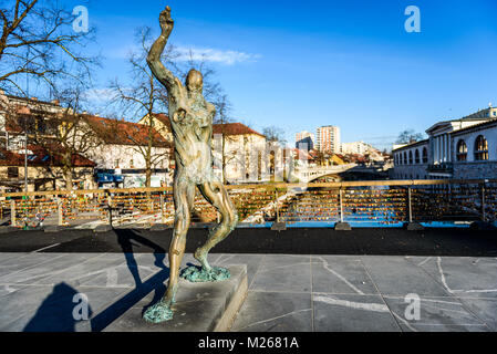 Statue of Prometheus on Butchers' bridge over river Ljubljanica, Ljubljana. A sculpture of Prometheus by famous Slovenian sculptor Jakov Brdar on brid Stock Photo