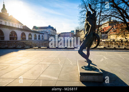 Statue of Prometheus on Butchers' bridge over river Ljubljanica, Ljubljana. A sculpture of Prometheus by famous Slovenian sculptor Jakov Brdar on brid Stock Photo