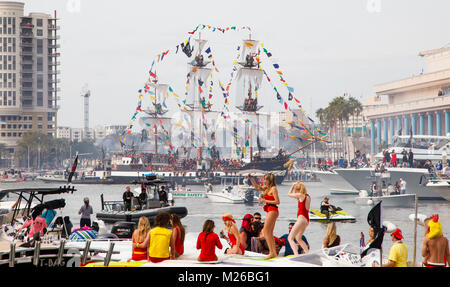 The Jose Gaspar pirate ship approaches downtown Tampa during the 2018 Gasparilla Pirate invasion festival in Tampa, Florida. (Photo by Matt May/Alamy) Stock Photo