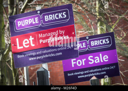 Purple Bricks property sale and to let signs Stock Photo