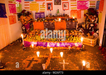 TLAXCALA, MEXICO - NOVEMBER 1, 2017 Night scene of a colorful traditional mexican altar during celebration of the Day of the dead Stock Photo