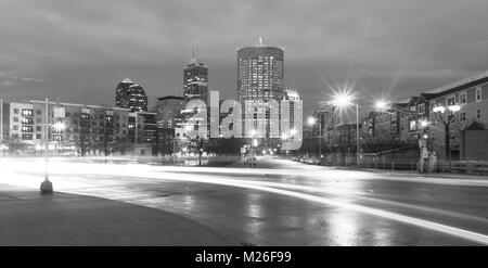 Long exposure as cars turn up Michigan Street in downtown Indianapolis Indiana Stock Photo