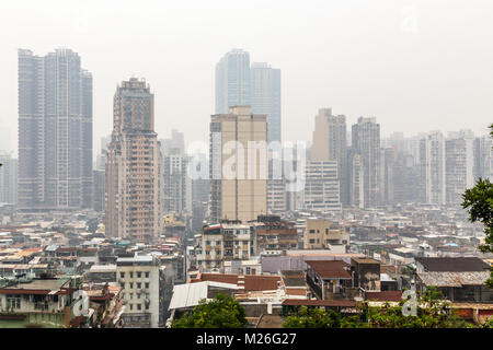 Macau city center panorama with poor slums blocks and tall living buildings, China Stock Photo