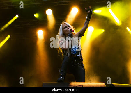 Norway, Kvinesdal – July 7, 2017. The German heavy metal singer and songwriter Doro Pesch (pictured) performs a live concert as Doro Pesch’s Warlock during the Norwegian music festival Norway Rock Festival 2017. Stock Photo
