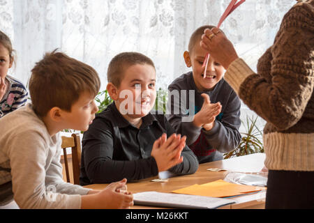CHAPAEVSK, SAMARA REGION, RUSSIA - JANUARY 31, 2018: School kids of elementary school in the classroom with a female teacher Stock Photo