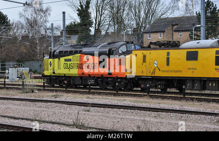Colas Rail Freight Class 37 with overhead line inspection train at Cambridge, England, UK Stock Photo
