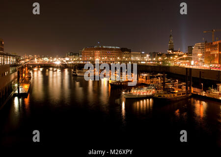 View of Hamburg by night with Binnenhafen, Slomanhaus and St. Michaelis church ('Michel') Stock Photo