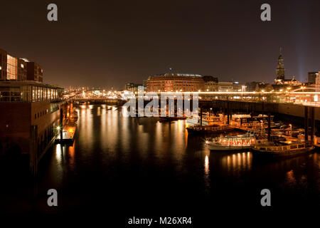 View of Hamburg by night with Binnenhafen, Slomanhaus and St. Michaelis church ('Michel') Stock Photo