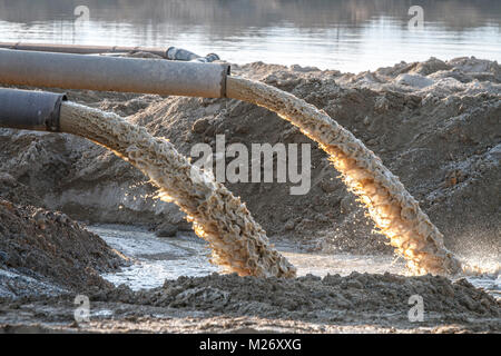 industrial effluent, pipeline discharging liquid industrial waste into ...