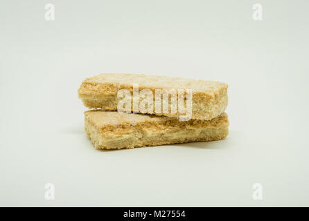 Two shortbread fingers vovered in sugar and isolated on white background Stock Photo