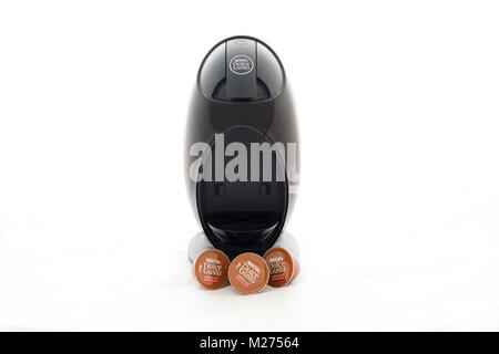 Largs, Scotland, UK - February 03, 2018: A Nescafe Dolce Gusto coffee machine with three coffee refills. The machine is designed primarily for home us Stock Photo