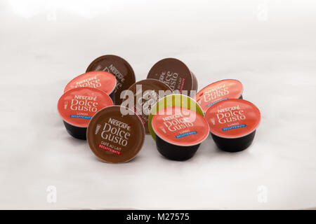 Largs, Scotland, UK - February 03, 2018: An assortment of ten nescafe Dolci Gusto Refills for the ever popular machine of the same name. Isolated on a Stock Photo