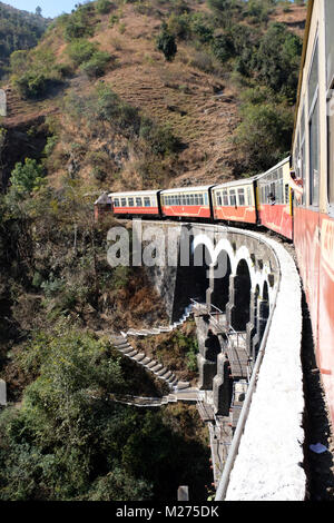 The 'Toy Train' fropm Kalka to Shimla crossing a bridge, India Stock Photo