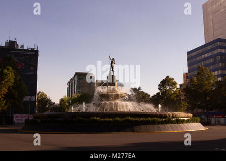 Diana the Huntress Fountain in a beautiful sunset Stock Photo