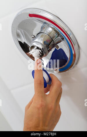 Fix of broken shower faucet cold and hot water in the bathroom Stock Photo