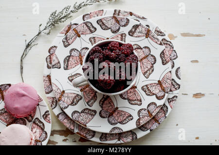 BlackBerry in a Cup covered with crushed ice.Light and healthy snack, Breakfast and dessert Stock Photo