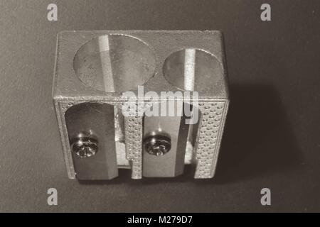 close up shot of a silver metal pencil sharpener Stock Photo