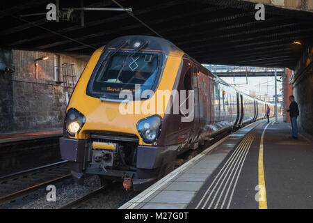 A Class 221 Super Voyager train stands at Motherwell before departing for Bristol Temple Meads. This unit, 221133, is operated by Cross Country Trains Stock Photo