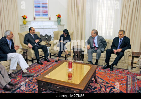 Prime Minister-designate Jawad al-Maliki of Iraq (2nd from left) meets with United States Secretary of State Condoleezza Rice (center), US Secretary of Defense Donald H. Rumsfeld (2nd from right) and US  Ambassador to Iraq Zalmay Khalilzad in Baghdad, Iraq, on April 26, 2006.  Rumsfeld and Rice made an unannounced visit to Iraq to meet jointly with al-Maliki to show support for the continuing process of building a new Iraqi government.  Rumsfeld is also meeting with senior military leaders and the troops while in Iraq.  Mandatory Credit: Chad J. McNeeley / DoD via CNP /MediaPunch Stock Photo
