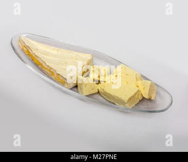 Cheese Pieces on a Glass Bowl Stock Photo