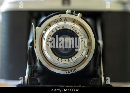 Close up of Agnar Lens of Agfa Isolette 1 compact horizontal-folding camera Stock Photo
