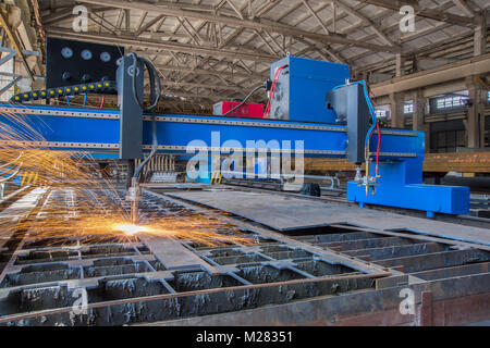 semi-automatic gas-welding machine and laser cutting in the process. pipe cutting system Stock Photo