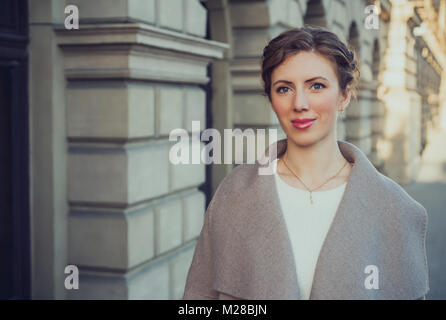 Portrait of a young, beautiful woman outdoors Stock Photo
