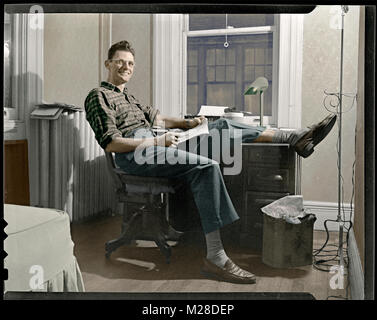 Arthur Miller working in New York City November 18, 1945. A leading American playwright of the Broadway stage, Miller's dramatic works include: Death of Salesman, The Crucible and screenplay for The Misfits, which was his wife Marilyn Monroe's last movie in 1961. Stock Photo