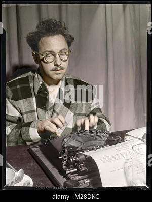 Tennessee Williams working at his typewriter in 1946. American dramatist and writer Tennessee Williams was one of America's major playwrights. He is best known for The Glass Menagerie, A Streetcar Named Desire and Cat on a Hot Tin Roof. Stock Photo