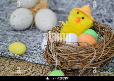 chocolate eggs of various colors with decorations Stock Photo
