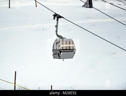 Gondola at ski resort with white snow in winter Stock Photo