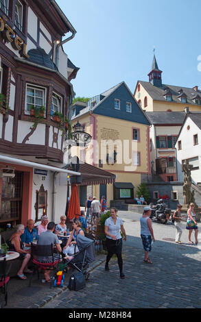 Outside gastronomy at half-timbered houses, historic old town of Bernkastel-Kues, Moselle river, Rhineland-Palatinate, Germany, Europe Stock Photo