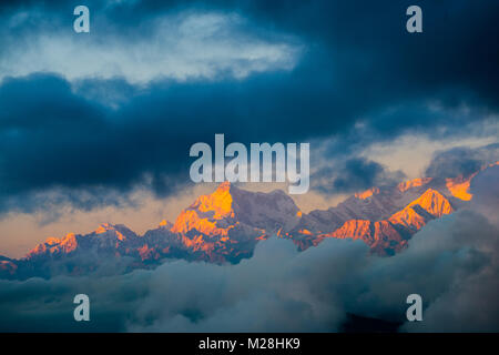 Dramatic landscape Kangchenjunga mountain with colorful from sunlight at Sandakphu, north of India Stock Photo