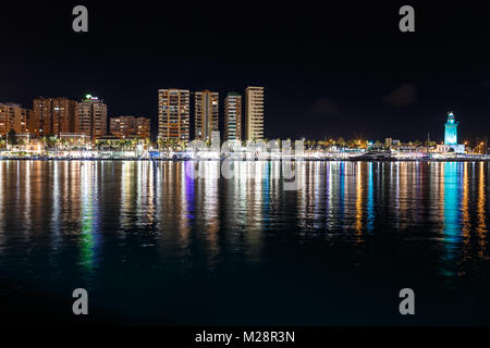City at night with reflection in the water Stock Photo