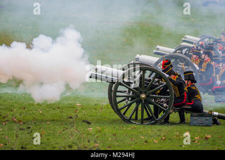 London, UK. 6th February, 2018. Firing the salute. On the 100th anniversary of women getting the vote, Kings troop is led by female officers and has a high proportion of female troopers - The King’s Troop Royal Horse Artillery, ride their horses and gun carriages past Buckingham Palace to Green Park to stage a 41 Gun Royal Salute to mark the 66th Anniversary of the Accession of Her Majesty The Queen. Credit: Guy Bell/Alamy Live News Stock Photo