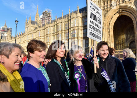 London, UK.  6 February 2018.  (2nd left) Emily Thornberry joins female members of the Shadow Cabinet and Labour politicians outside the Houses of Parliament, wearing Labour styled suffragette rosettes, holding placards next to a ‘100 Years of Women Voting’ banner to help launch Labour's campaign to celebrate 100 years of women’s suffrage.  Credit: Stephen Chung / Alamy Live News Stock Photo