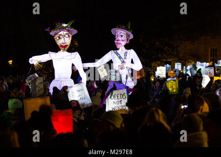 Bristol, UK. 6th Feb, 2018. Despite sleet and snow thousands of people joined a lantern parade in Bristol, timed to coincide with the the 100 year anniversary of the signing of the Representation of The People Act, which allowed some women to vote in the UK for the first time.  At one point a small counter demonstration from a transgender protest group blocked the path of the parade but they were quickly pushed aside. Bristol, UK. 6th February 2018. Credit: Redorbital Photography/Alamy Live News Stock Photo