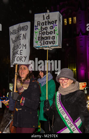 Bristol, UK. 6th Feb, 2018. Despite sleet and snow thousands of people joined a lantern parade in Bristol, timed to coincide with the the 100 year anniversary of the signing of the Representation of The People Act, which allowed some women to vote in the UK for the first time.  At one point a small counter demonstration from a transgender protest group blocked the path of the parade but they were quickly pushed aside. Bristol, UK. 6th February 2018. Credit: Redorbital Photography/Alamy Live News Stock Photo
