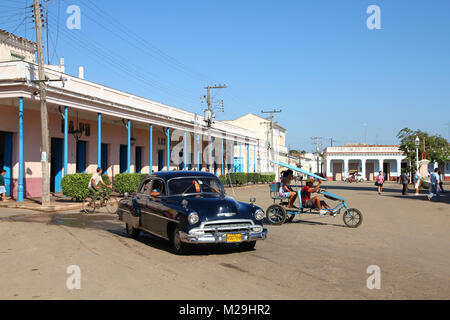REMEDIOS, CUBA - FEBRUARY 21: Classic American car in the street on February 21, 2011 in Remedios, Cuba. The multitude of oldtimer cars in Cuba is its Stock Photo