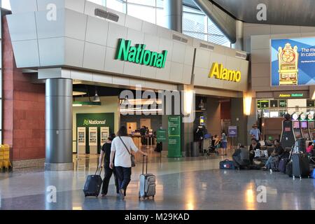 LAS VEGAS, USA - APRIL 13, 2014: Alamo and National car rental airport office in Las Vegas. Both brands are owned by Enterprise Holdings, company empl Stock Photo