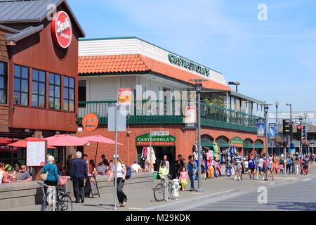 SAN FRANCISCO, USA - APRIL 8, 2014: People visit Fisherman's Wharf in San Francisco, USA. San Francisco is the 4th most populous city in California (8 Stock Photo