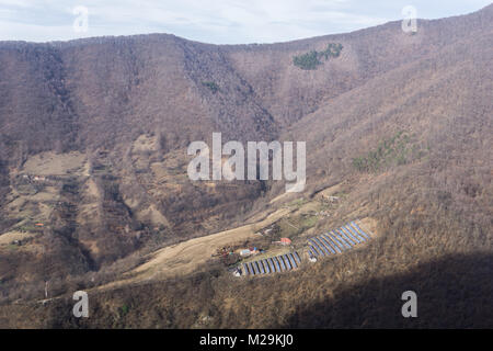 Solar power installation on a hillside outside the town of Baile Herculane, Romania Stock Photo