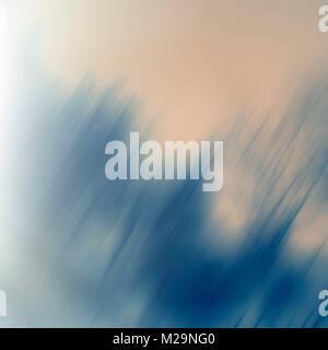 Abstract blurred yellow background. Diagonal blue colored lines and spots on the yellow. Design element. Stock Photo