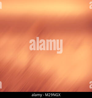 Abstract blurred yellow background. Diagonal orange colored lines and spots on the yellow. Design element. Stock Photo