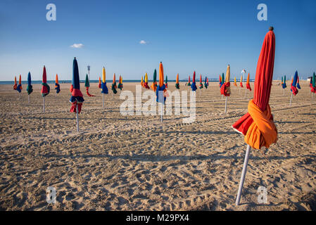 Colorful parasols on Deauville beach, France Stock Photo