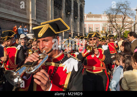 Music band performing a processional march during a procession of Holy Week. Stock Photo