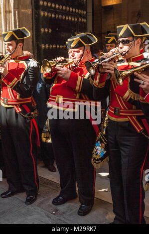 Music band performing a processional march during a procession of Holy Week. Stock Photo